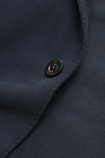 Close-up front detail of the navy tonal herringbone Boglioli Blazer 'K. Jacket' showing button and fabric texture, photographed head-on.

Description: <p>Ideal for business and leisure: With the simple unconstructed blazer 'K. Jacket' from BOGLIOLI made o