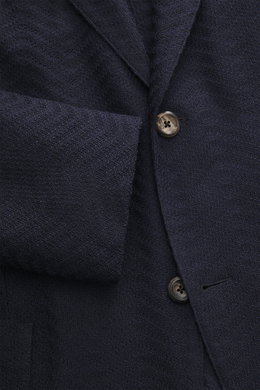 Close-up front view of Emporio Armani Knitted blazer navy showing tonal herringbone knit, two-button style, notched lapel, and patch hip pocket.

Additional description:  
<p>Noble piece with a twist by EMPORIO ARMANI: With this blazer made of fine struct