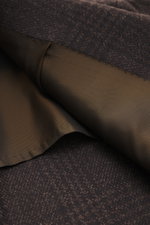 Close-up view of the interior lining and textured Glen check fabric of the Cesare Attolini Cashmere Blazer dark brown/black checkered, showing soft pure cashmere material.

Description: Treat yourself to luxury by CESARE ATTOLINI: This timeless blazer is 