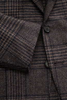 Close-up front view of the Cesare Attolini Cashmere Blazer taupe/dark brown checked showing buttons, notched lapel, and patch hip pocket in classic Glencheck pattern.  
<p>Indulge in luxury from CESARE ATTOLINI: This timeless blazer is exclusively made in