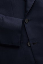 Close-up front view of the Cesare Attolini Cashmere Blazer navy, showcasing its double-breasted three-button style, notched lapel, and pure cashmere fabric with a very soft feel. Treat yourself to luxury with CESARE ATTOLINI: This double-breasted blazer w