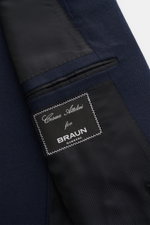 Close-up view of the Cesare Attolini Cashmere Blazer navy inner pocket and label, showing pure cashmere fabric and fine stitching.

Description: Treat yourself to luxury with CESARE ATTOLINI: This double-breasted blazer was made in Italy from pure, finest