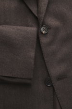 Close-up front view of the Belvest Cashmere blazer dark brown showing pure cashmere with a very soft feel, tonal herringbone weave pattern, slim fit, tailored two-button style, notched lapel with brand-typical pin, classic breast pocket, hip pockets with 