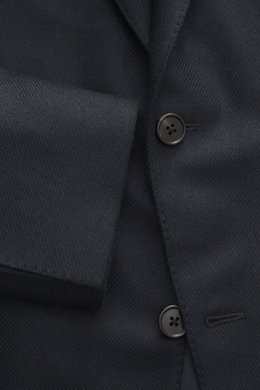 Close-up front view of the Belvest Cashmere Blazer navy showing pure cashmere fabric, soft feel, Slim Fit, tailored two-button style with notched lapel, brand-typical pin on lapel, classic breast pocket, hip pockets with flap, unfinished sleeve cuffs, rea