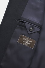 Close-up inside view of the Belvest Cashmere Blazer navy showing smooth lining, four inner pockets, and button details, pure cashmere, soft feel, Slim Fit, tailored two-button style, notched lapel with brand-typical pin, classic breast pocket, hip pockets