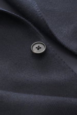 Close-up front view of Belvest Cashmere Blazer navy button and fabric texture, pure cashmere, soft feel, Slim Fit, tailored two-button style, notched lapel with brand pin, classic breast pocket, hip flap pockets, unfinished sleeve cuffs, rear side vents, 
