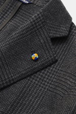 Close-up front oblique view of Belvest Cashmere Blazer gray/anthracite checkered with colorful floral button, showcasing soft pure cashmere fabric and subtle Prince-of-Wales pattern.

<p>Super soft material quality combines BELVEST in this blazer with a t