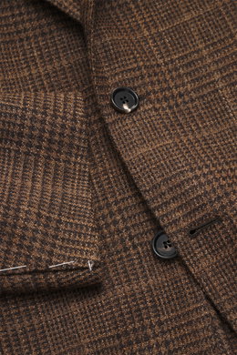 Close-up front view of Borrelli Blazer 'Procida' brown/dark brown checkered, a slim fit tailored three-button style with notched lapel, classic Glencheck pattern, slightly textured mix of wool and silk fabric, featuring classic breast pocket, patch hip po