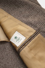 Close-up inside view of Borrelli Blazer 'Procida' beige/dark brown checkered showing beige lining and label, made of pure virgin wool, soft touch, classic Glen check.