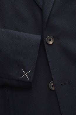 Close-up front view of Colombo Kid Cashmere Blazer 'Robert' navy showing soft pure kid cashmere fabric, notched lapel, two-button style, classic breast pocket, patch hip pocket, unfinished sleeve cuff with white thread, and branded button. In the ultra-li