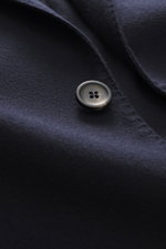 Close-up front view of Colombo Kid Cashmere Blazer 'Robert' navy showing pure kid cashmere fabric, soft touch, and branded button.