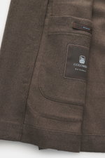 Close-up front-side view of Colombo Kid Cashmere Blazer 'Robert' taupe showcasing unconstructed design, patch hip pocket, and label.