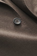Close-up front view of Colombo Kid Cashmere Blazer 'Robert' taupe showing soft kid cashmere fabric and branded button detail.