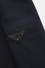 Close-up image of the Lardini Jersey Blazer navy sleeve, showing elastic virgin wool fabric, button detail, and inner lining, photographed from the side. Jersey made of elastic virgin wool, soft touch, Slim Fit, tailored two-button style, notched lapel wi
