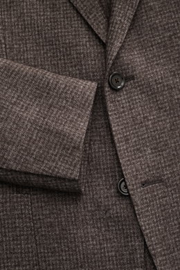 Close-up front view of Lardini Blazer grey-brown patterned showing slim fit, tailored two-button style, notched lapel with flower pin, classic breast pocket, patch hip pockets, unfinished sleeve hems, mix of wool and microfiber, soft feel, subtle check pa