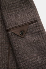Close-up view of the sleeve cuff and pocket of the Lardini Blazer grey-brown melange, showing soft wool, microfiber, cotton mix, airy woven Glencheck fabric, slim fit, two-button style, notched lapel with flower pin, classic breast pocket, patch hip pocke