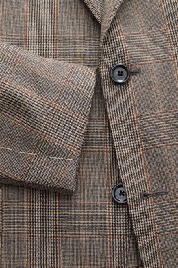 Lardini Blazer Beige/Black Checked shown from a close-up front angle, featuring pure virgin wool, soft touch, Glencheck woven pattern, slim fit, tailored two-button style, notched lapel with flower pin, classic breast pocket, patch hip pockets, unfinished