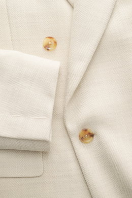 Close-up front view of the Lardini Blazer sand melange showing double-breasted two-button style, notched lapel with flower pin, classic breast pocket, patch hip pockets, mix of virgin wool and silk, structured jersey, soft touch, lightweight quality, slim