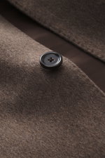 Close-up front perspective of Lardini Cashmere blazer grey brown showing pure cashmere fabric with soft touch, slim fit, stand-up collar with tab, tailored four-button style, patch hip pockets, buttoned sleeve cuffs, center back vent, unconstructed design
