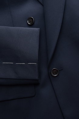 Close-up front view of Lardini Blazer navy, gabardine made of pure new wool with smooth feel, slim fit, notch lapel, double-breasted two-button style, classic breast pocket, hip pockets with flap, unfinished sleeve cuffs, rear side vents, half lined, and 