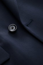 Close-up shot of Lardini Blazer navy fabric, showing button and buttonhole; gabardine made of pure new wool, smooth feel, slim fit, notch lapel, double-breasted two-button style, classic breast pocket, hip pockets with flap, unfinished sleeve cuffs, rear 