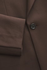 Lardini Dark Brown Blazer close-up from the front showing notched lapel, double-breasted two-button style, gabardine pure new wool, smooth touch, slim fit, classic breast pocket, hip pockets with flap, unfinished sleeve cuffs, rear side vents, half lined,