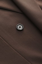 Close-up front view of Lardini Dark Brown Blazer fabric and button, gabardine pure new wool, smooth touch, slim fit, notched lapel, double-breasted two-button style, classic breast pocket, hip pockets with flap, sleeve cuffs unfinished, rear side vents, h