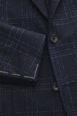 Tagliatore Blazer navy/black checked close-up front view showing slim fit tailored two-button style with notched lapel, virgin wool and microfiber mix, Prince of Wales pattern, soft feel, classic breast pocket, patch hip pockets, rear side vents, unconstr