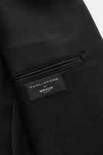 Close-up inside view of Tagliatore Black Blazer showing wool-cashmere fabric, inner pocket, and label, photographed from above.

Description: <p>The unconstructed processing made from fine wool with cashmere makes this blazer by TAGLIATORE an exclusive co