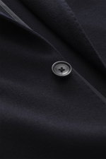 Close-up front view of Tagliatore Cashmere Blazer dark navy showing soft pure cashmere fabric and black button detail.

Description: <p>The unconstructed craftsmanship made from pure cashmere makes this lightweight blazer by TAGLIATORE an exclusive compan