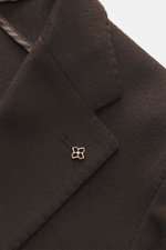 Close-up front right side view of the Tagliatore Cashmere Blazer Dark Brown lapel showing pure cashmere fabric, soft touch, slim fit, tailored two-button style, notched lapel, brand-typical pin, and detailed stitching. <p>The unconstructed design made fro
