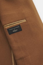 Close-up of the inner pocket and label of the Tagliatore Cashmere Blazer Brown, showing soft pure cashmere fabric from a top-down angle.

<p>The unconstructed design made from pure cashmere makes this lightweight blazer by TAGLIATORE an exclusive companio