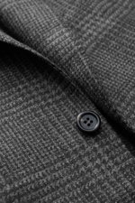 Close-up front view of Canali Blazer Dark Grey/Grey Checked, pure wool with Prince-of-Wales pattern, soft touch, slim fit, tailored two-button style, notched lapel, classic breast pocket, hip pockets with flap, unfinished sleeve cuffs, rear side vents, un
