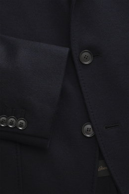Close-up front view of the Brioni Jersey blazer navy showing the soft cashmere and silk jersey fabric, slim fit, tailored three-button style, notched lapel, leather collar trim with embossed logo, classic chest pocket, patch hip pockets, kissing buttons, 