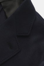 Close-up front view of Brioni Jersey blazer navy lapel and collar, made from finest cashmere and silk jersey with soft, unconstructed design.