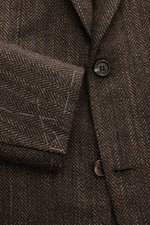 Brioni Blazer 'Ravello' dark brown/brown patterned close-up from front, showing wool-silk herringbone weave, button, and lapel details.