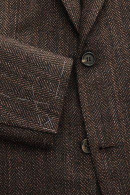 Brioni Blazer 'Ravello' dark brown/brown patterned close-up from front, showing wool-silk herringbone weave, button, and lapel details.