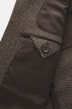 Nahaufnahme des Zegna Sakko dunkelbraun/beige kariert von innen, zeigt feines Webmuster, Knopfmanschette und weiches Cashmere-Seide-Futter.