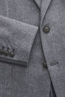 Circolo 1901 Jersey-Sakko graublau gemustert, Slim Fit, tailliert, zweiknöpfig, fallendes Revers, Weboptik, Detailaufnahme von vorne mit Ärmel und Knöpfen.