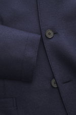 Harris Wharf London Smart-casual jacket 'Nehru Jacket' anthracite melange shown in close-up from the front, highlighting button, cuff, and wool texture. The stylish unconstructed smart-casual jacket 'Nehru Jacket' made of fine, pressed virgin wool with ra