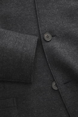 Harris Wharf London Smart-casual jacket 'Nehru Jacket' anthracite melange shown in close-up from top front angle, featuring pure virgin wool, soft feel, slim fit, raw-edged finish, fitted four-button style, blouson collar, patch hip pockets, unconstructed