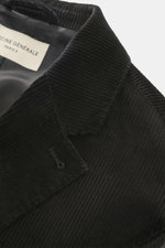 Schwarzes Officine Générale Cordsakko 'Michel' in Nahaufnahme von oben, feiner Cord aus Baumwolle, Slim Fit, fallendes Revers, weicher Griff.
