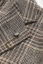 Close-up overhead view of Santaniello Beige/Brown Checked Blazer fabric and button with chain, showing Glencheck wool with cashmere texture.

Additional description:  
<p>Always well dressed: This elegant blazer by SANTANIELLO made of wool with cashmere a