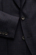 Close-up front view of the Santaniello Blazer navy/dark brown checked, pure wool with a subtle check woven pattern and soft touch.