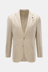 Santaniello Sakko sand meliert, frontale Nahaufnahme, Slim Fit Sakko aus reiner Wolle mit weichem Griff, tailliert, zwei Knöpfe, fallendes Revers, Brusttasche, Hüfttaschen, Kissing Buttons, Seitenschlitze, Unconstructed Design, zwei Innentaschen.