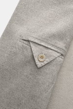 Close-up view of the Santaniello Blazer grey/offwhite striped sleeve cuff showing fine wool with cashmere fabric texture, button, and stitching details.