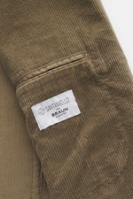 Close-up top view of Santaniello Cord Blazer khaki showing soft corduroy fabric and label inside the sleeve.

<p>Always well dressed: This cord blazer by SANTANIELLO made of soft cotton with cashmere reliably accompanies you through the coming season and 