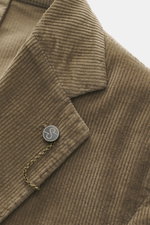 Close-up front view of the Santaniello Cord Blazer khaki showing soft corduroy fabric, notched lapel, and branded button with chain.