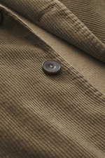 Close-up front view of the Santaniello Cord Blazer khaki showing soft corduroy fabric, a brown button, and detailed stitching.

Description: <p>Always well dressed: This cord blazer by SANTANIELLO made of soft cotton with cashmere reliably accompanies you