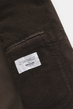 Close-up inside view of the Santaniello Cord Blazer dark brown showing soft corduroy fabric, inner pocket, and Braun Hamburg label.

Description: Always well dressed: This cord blazer by SANTANIELLO made of soft cotton with cashmere reliably accompanies y